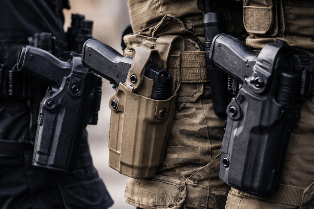 Tactical holsters and retention systems